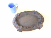 Black Cast Iron NO SMOKING sign indoors or outdoors